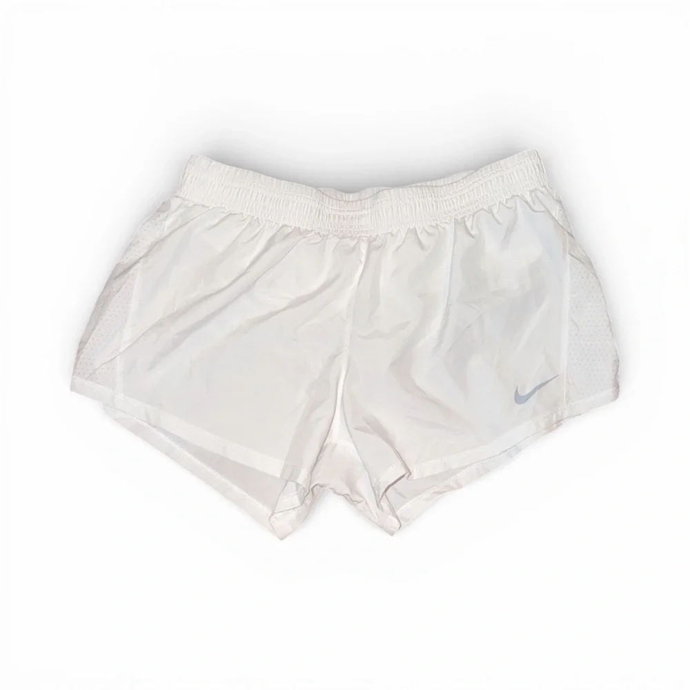 Nike Running Tempo Dri-FIT mid rise 3 inch shorts in white